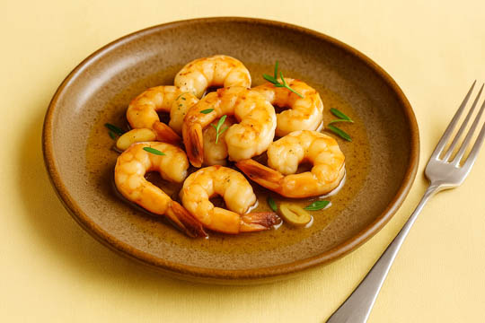 Gamberi al Calvados